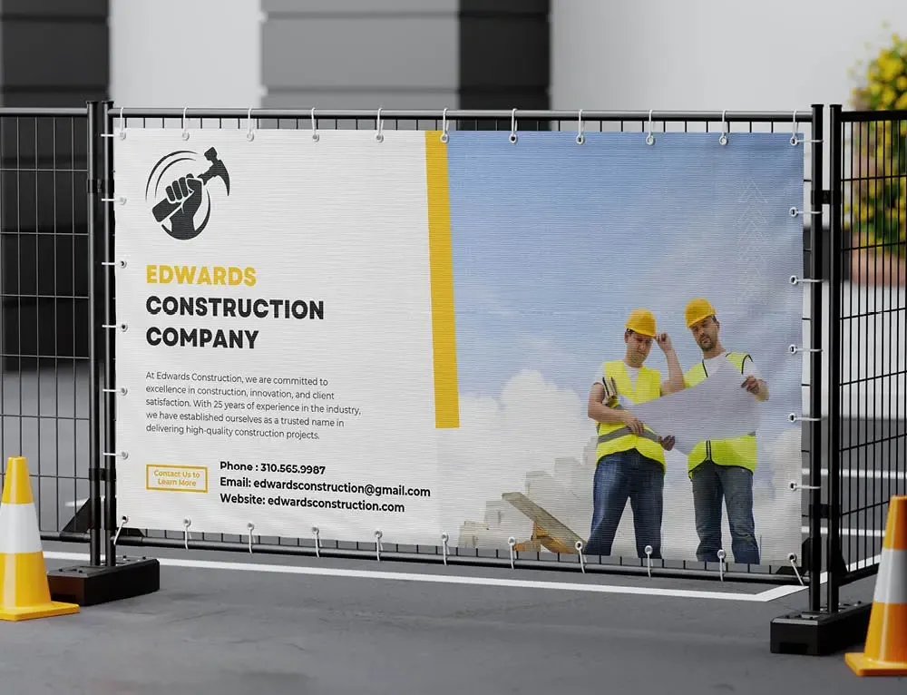 Sign advertising construction company on a fence