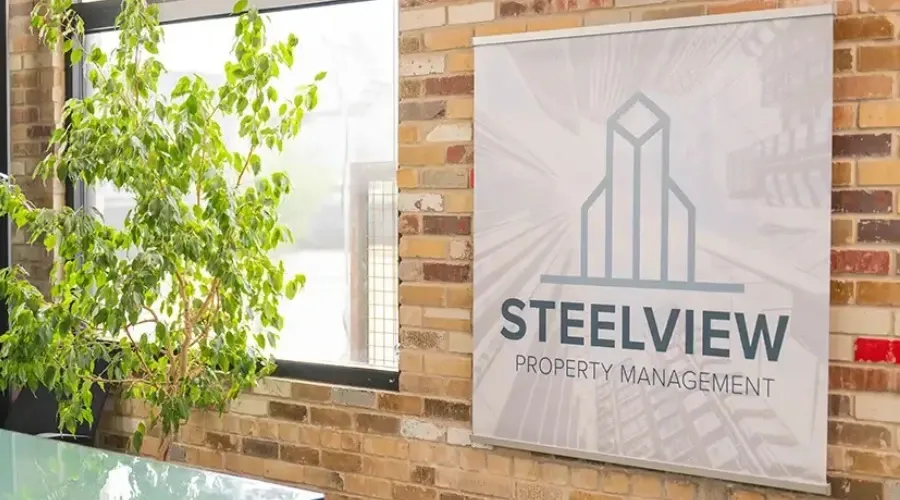 Indoor property management business signage example