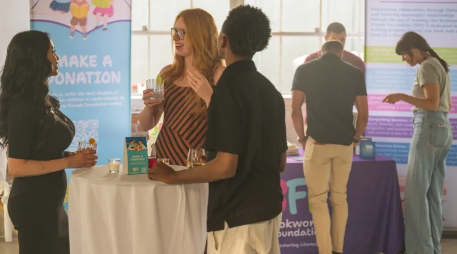 Young professionals networking at a nonprofit event.